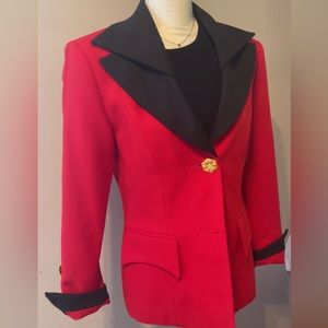Woman’s blazer.  Red with black trim. Size 8 US